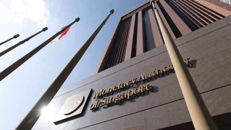 Singapore steps up inflation fight with surprise central bank tightening Singapore steps up inflation fight with surprise central bank tightening